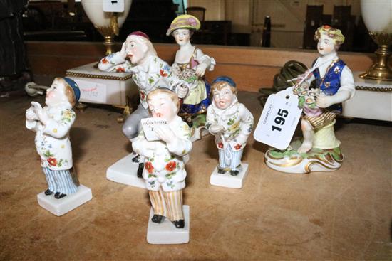 Pair of Derby porcelain figures in 18C costume holding flower baskets (faults)